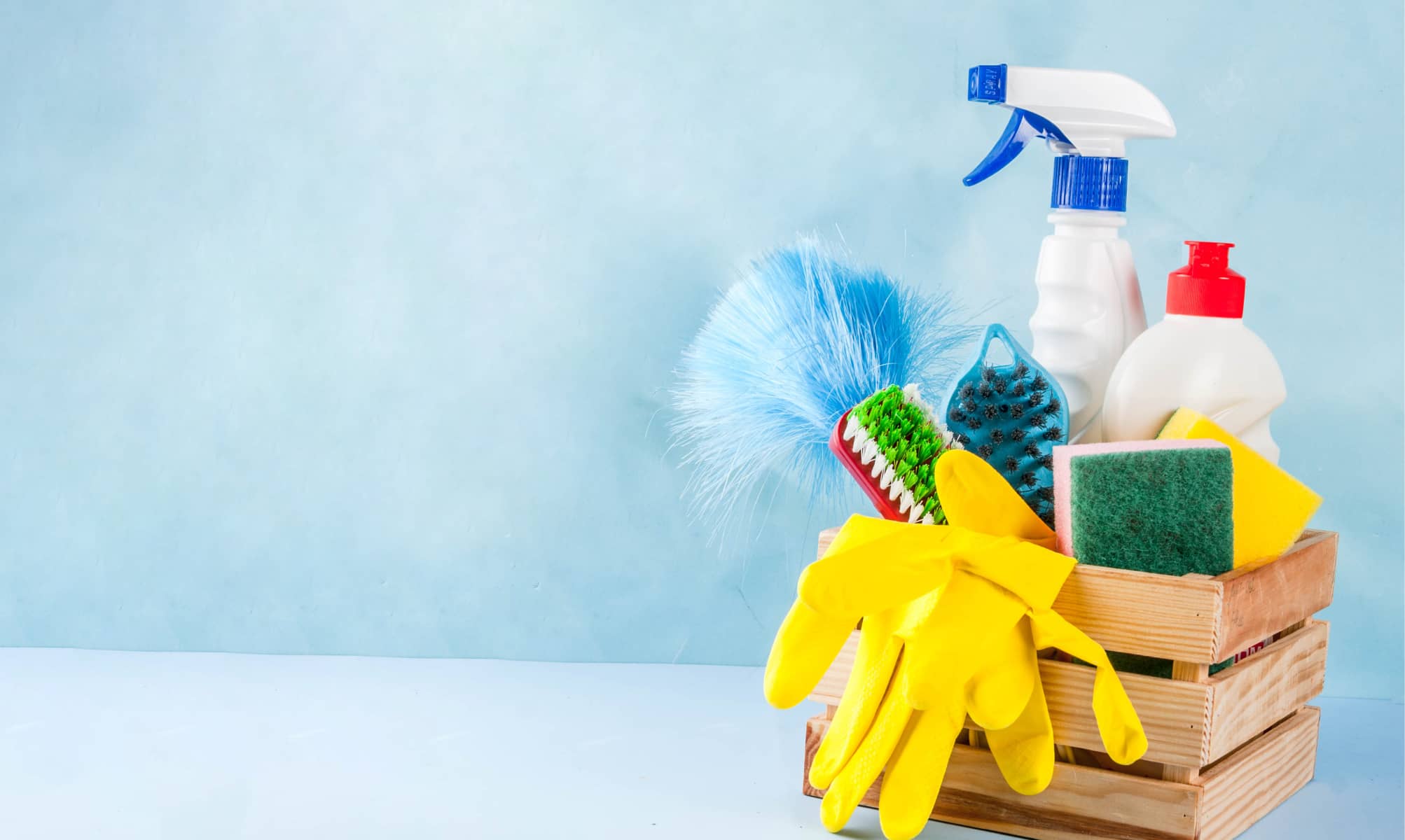 spring-cleaning-concept-with-supplies-house-cleaning-products-pile-household-chore-concept-light-blue-background-copy-space 1 (1)